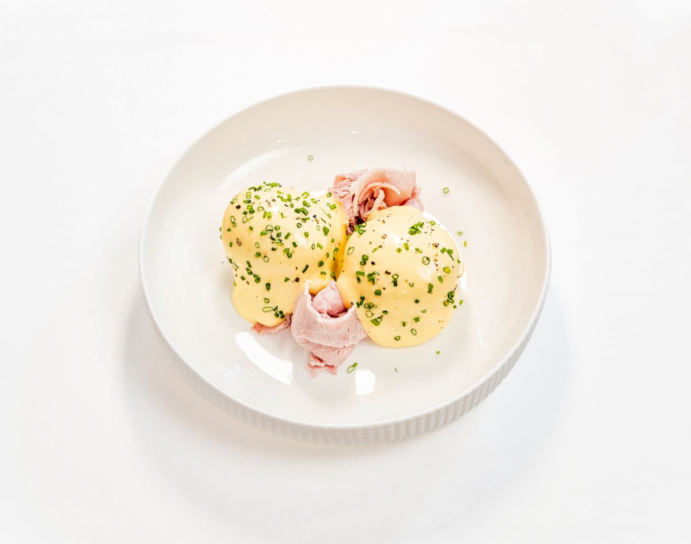 Eggs Benedict zum Frühstück